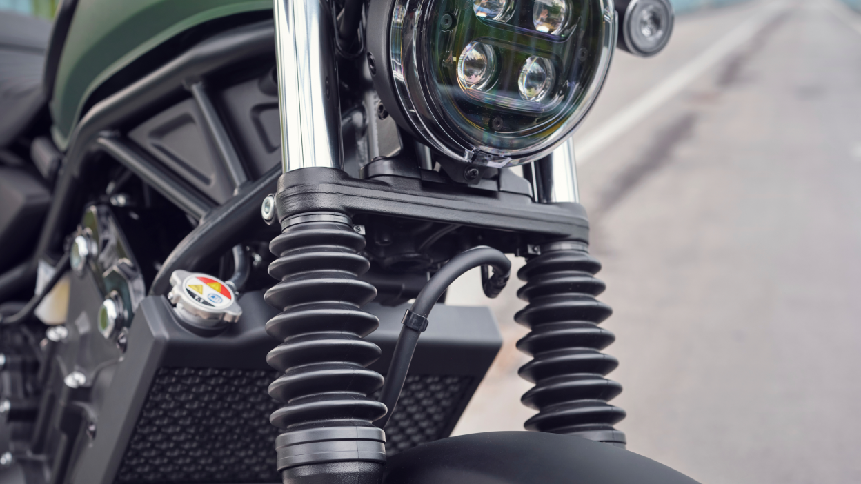 The shocks of a Honda standard motorcycle up close
