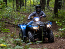 A rider on a Honda ATV/Un cavalier sur un Honda VTT